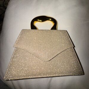 Elegant Cream Handbag with Gold Handle